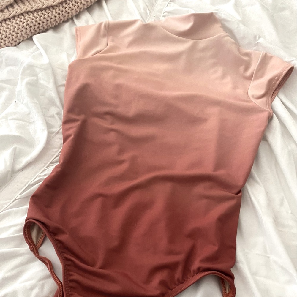 NWOT Peach ombré ballet leotard. High neck, low back. Child large.